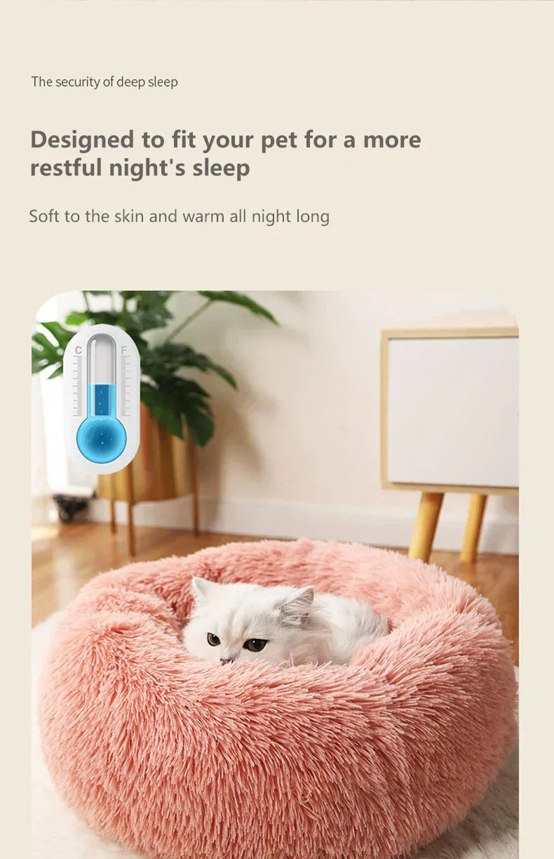 "Round plush pet bed in soft fabric, ideal for keeping pets warm in winter"machine washable dog beds