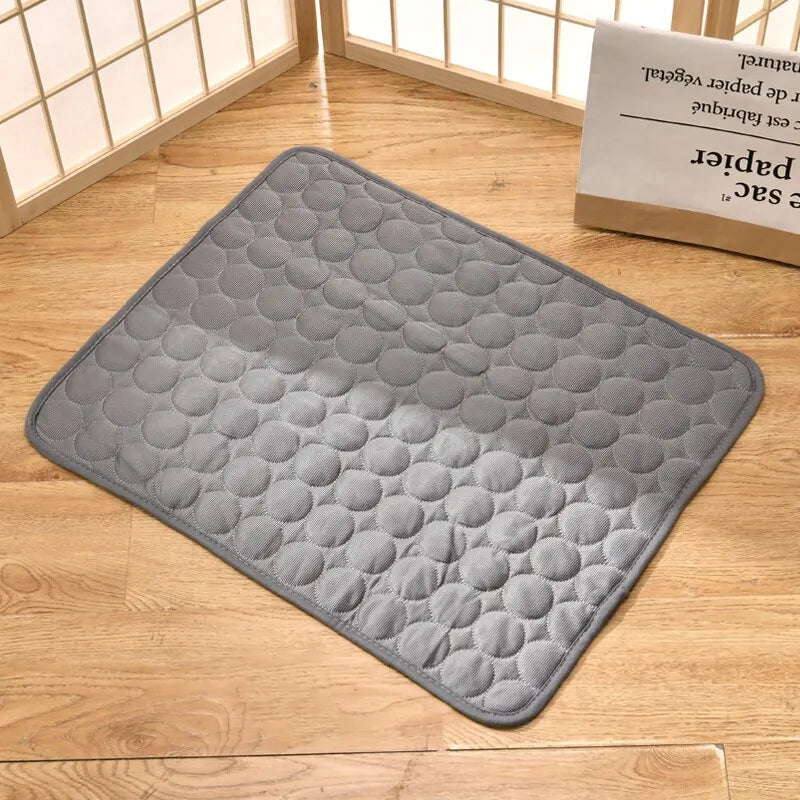 "Grey ice silk cooling pad for small pets, ideal for summer comfort"