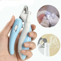 Professional pet nail clippers with LED light and ergonomic handle for pets.