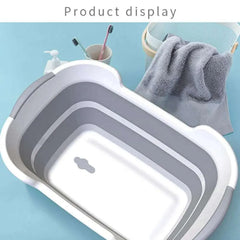Folding pet bath tub with drainage hole for portable dog grooming.