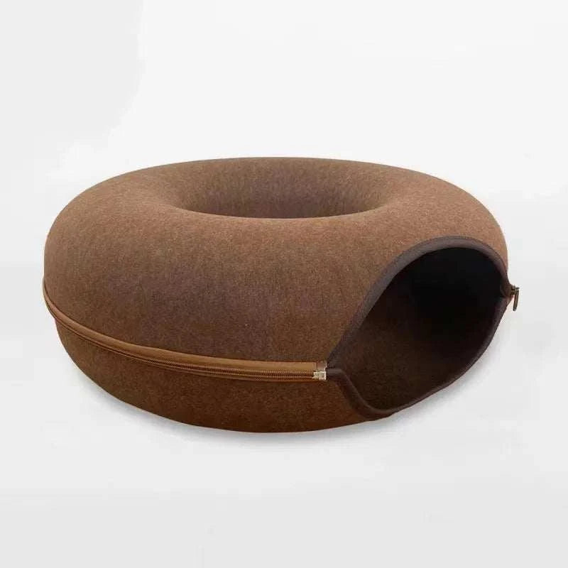 "Donut cat bed with interactive tunnel for playful indoor cats"