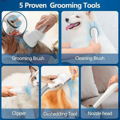 Dog grooming vacuum and pet grooming kit with brushes and tools.