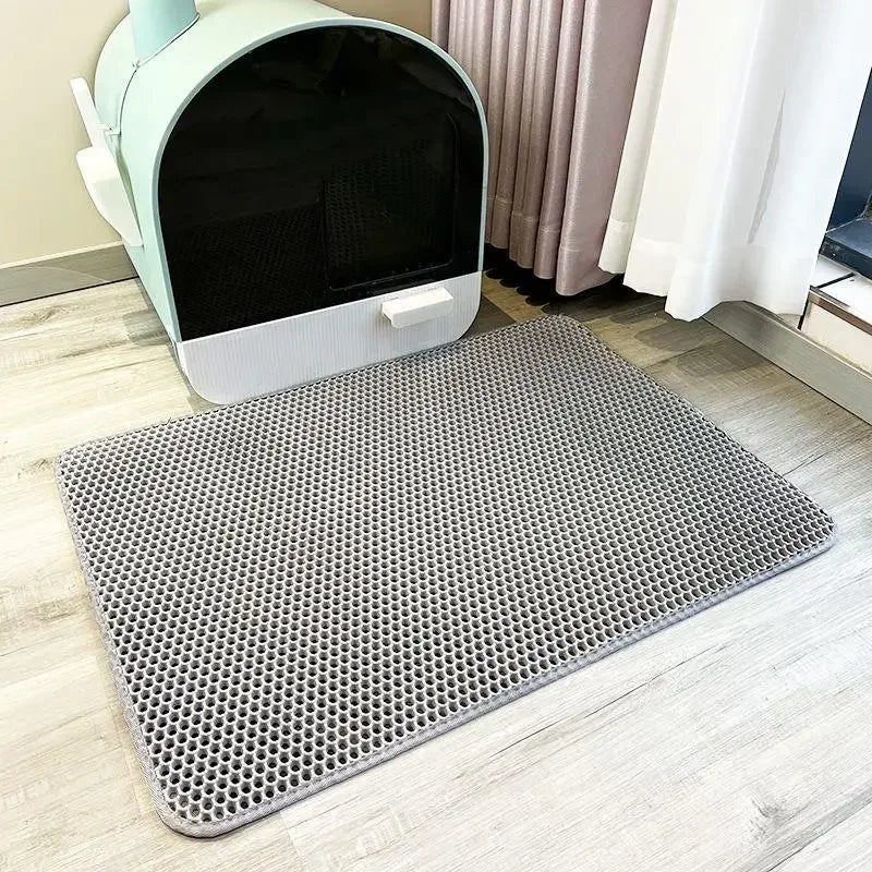 "Waterproof double layer cat litter mat with non-slip and easy-to-clean design"