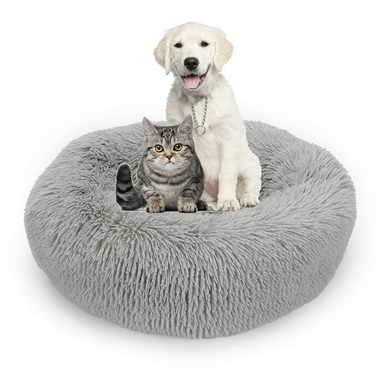 "Round plush pet bed in soft fabric, ideal for keeping pets warm in winter"machine washable dog beds